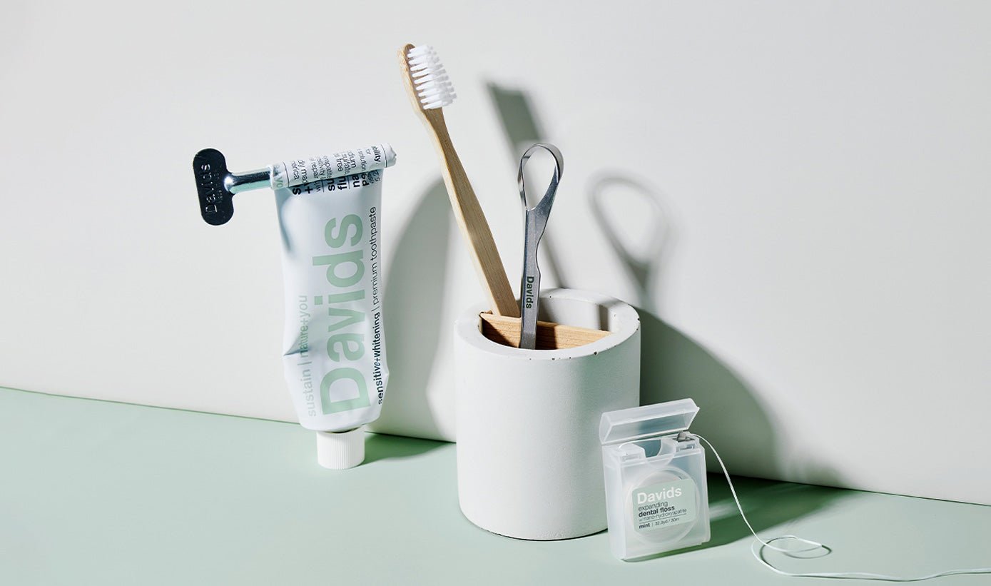 Davids toothpaste tube with toothbrushes