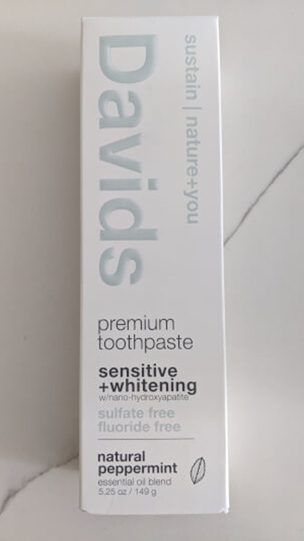 Photo of a box of Davids toothpaste on a bathroom counter