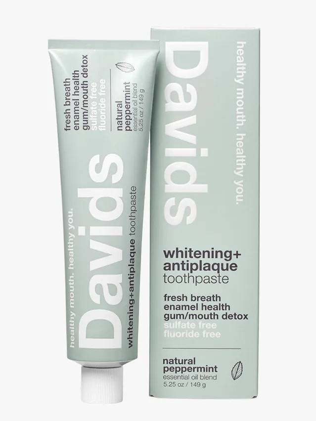 Closeup of mint green and white packaging of Davids nano hydroxyapatite toothpaste