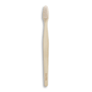 Bamboo toothbrush with white bristles on black background